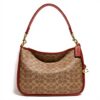 Borsa a tracolla COACH Cary Signature tela rivestita Tan