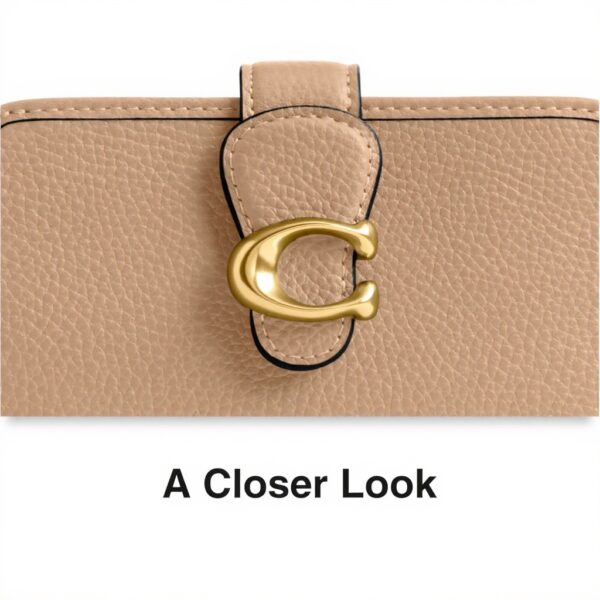 Portafoglio Coach pelle martellata lucida medio Tabby Talpa