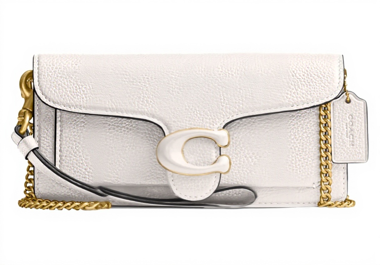 Pavo Monitor Arm installed on a wooden office desk