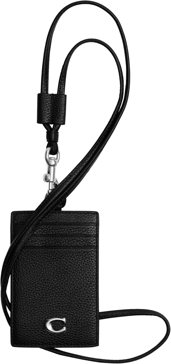 Pavo Monitor Arm installed on a wooden office desk